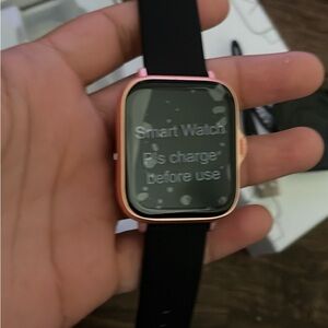 Apple Smartwatch with Black Band and Gold Case